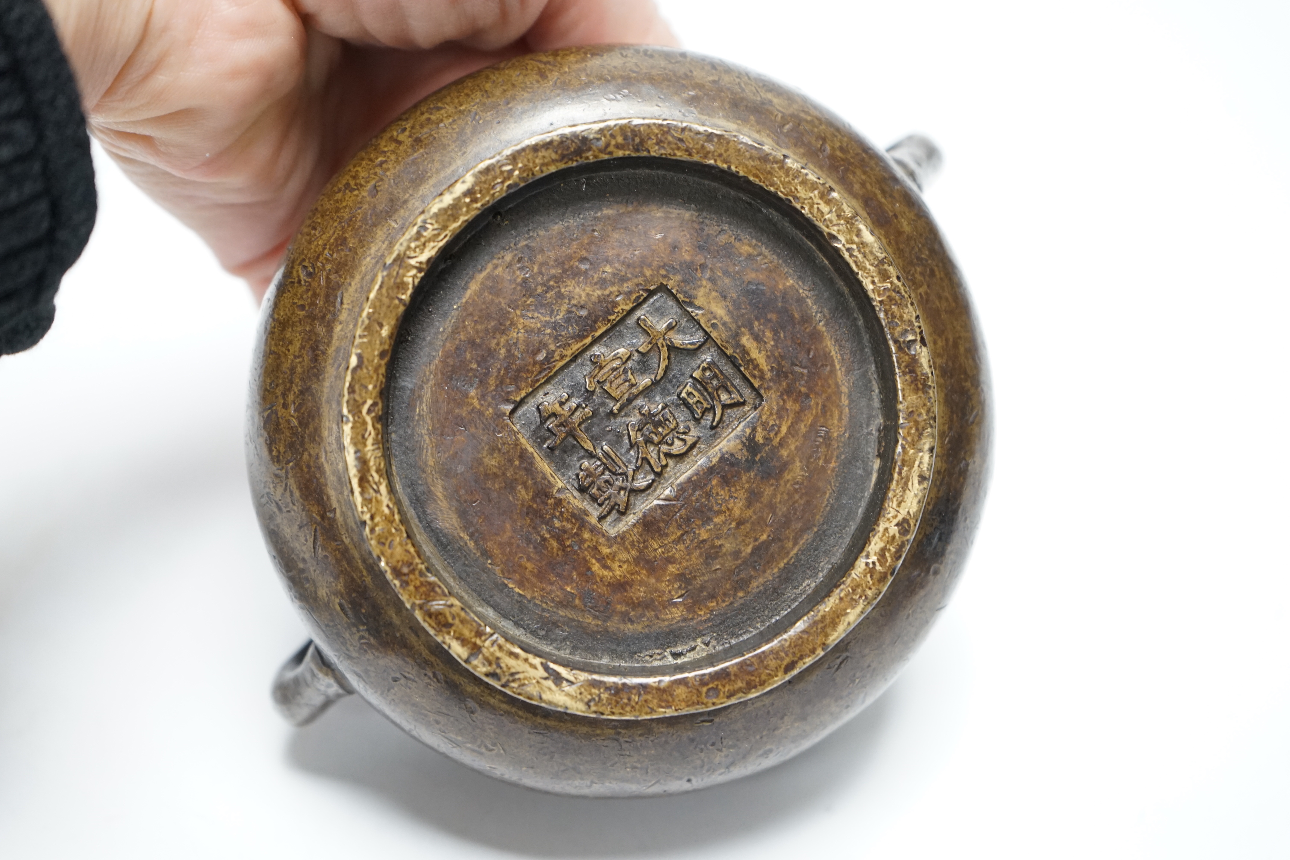 A Chinese bronze censer, Xuande mark, on plinth, 8cm